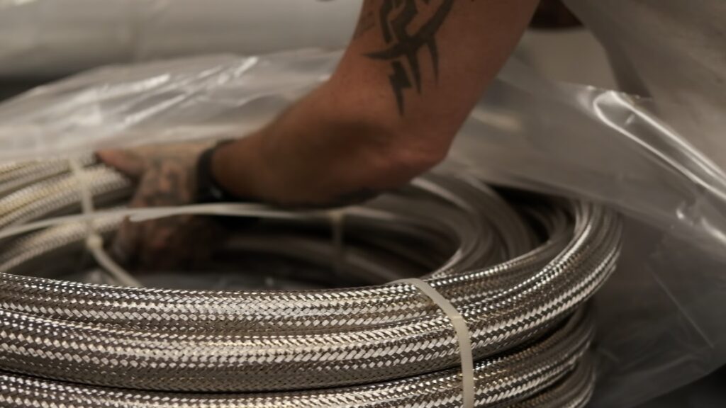 Mass spectrometer tested Clean ID hose assembly being bagged for shipment.