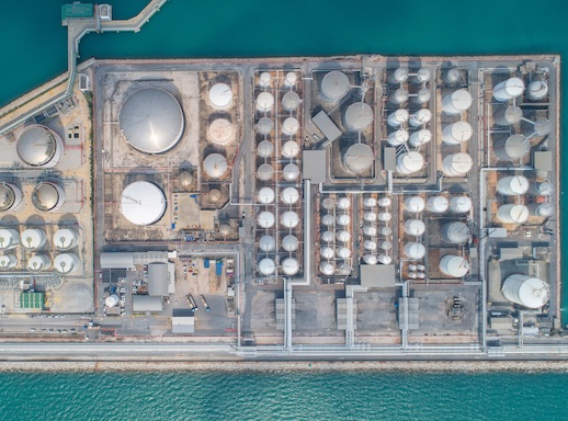 Aerial view of refinery and ship terminal