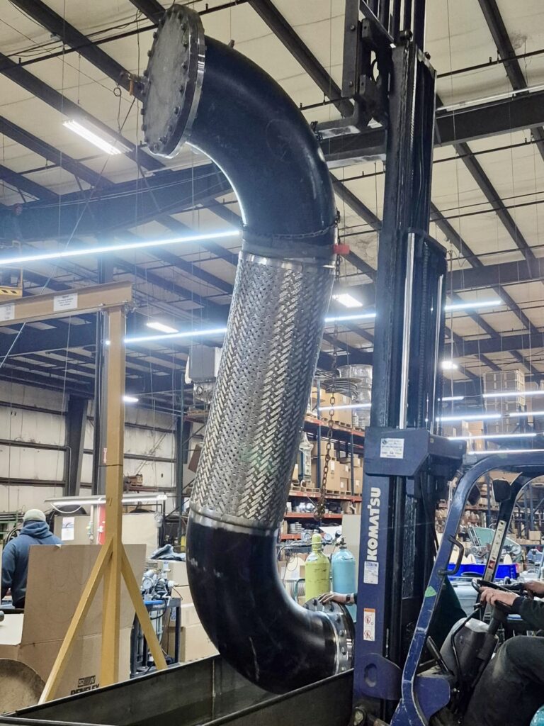 Hydrostatic test on 22" metal hose assembly in process.
